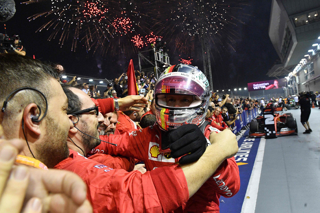 Pebalap Ferrari, Sebastian Vettel, menjadi juara Formula 1 ( F1) GP Singapura 2019. AFP Photo/Mladen Antonov