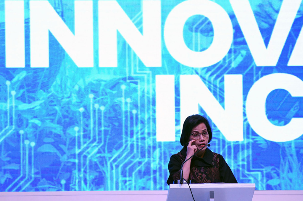 Menteri Keuangan Sri Mulyani Indrawati memberikan paparan pada Indonesia Fintech Summit & Expo 2019 di Jakarta Convention Center (JCC), Jakarta.