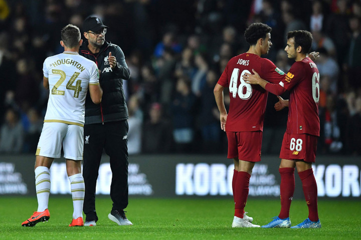Skor 2-0 bertahan hingga bubaran, dan membawa Liverpool melangkah ke babak 16 besar untuk bertemu sesama tim Premier League, Arsenal. 