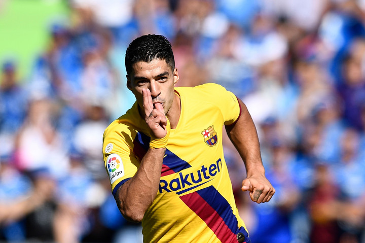 Suarez membuka keunggulan Barcelona pada menit ke-41.