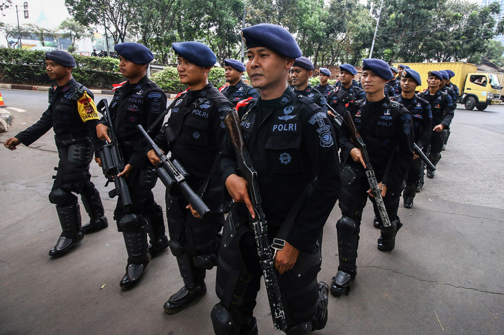 Sebanyak 30.000 personel gabungan dari TNI dan Polri dikerahkan untuk mengamankan pelantikan tersebut. Antara Foto/Rivan Awal Lingga