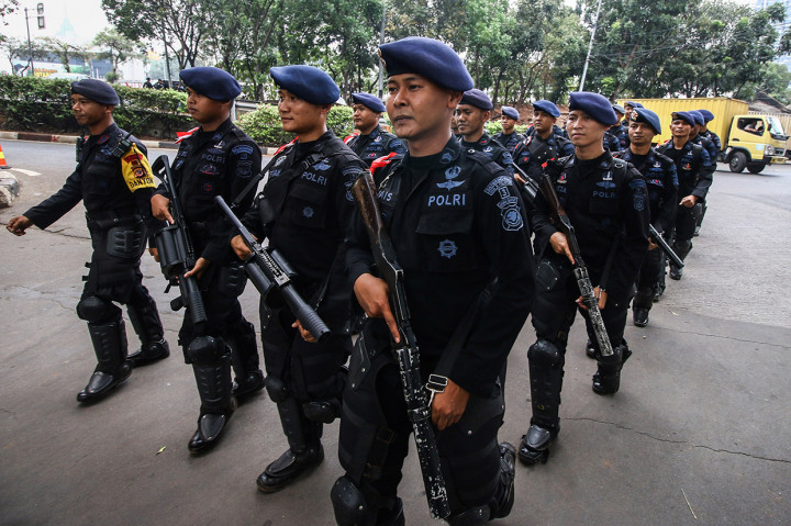 Sebanyak 30.000 personel gabungan dari TNI dan Polri dikerahkan untuk mengamankan pelantikan tersebut. Antara Foto/Rivan Awal Lingga