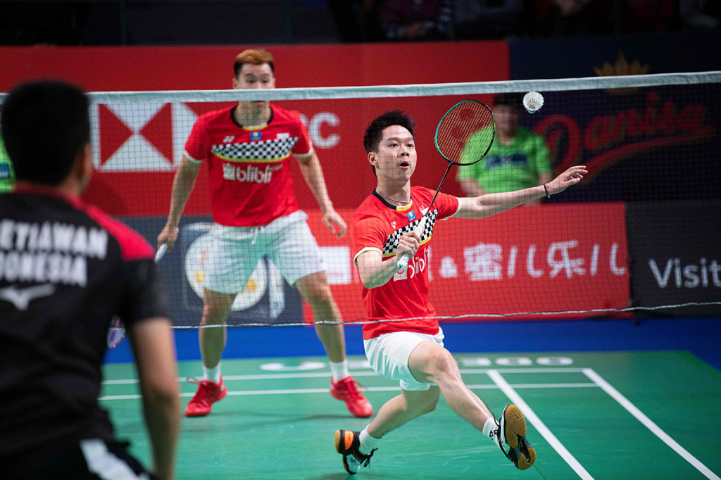Pasangan Marcus/Kevin menjuarai Denmark Open 2019 setelah menang dari pasangan Hendra/Ahsan dengan skor 21-14, 21-13. AFP Photo/Claus Fisker / Ritzau Scanpix