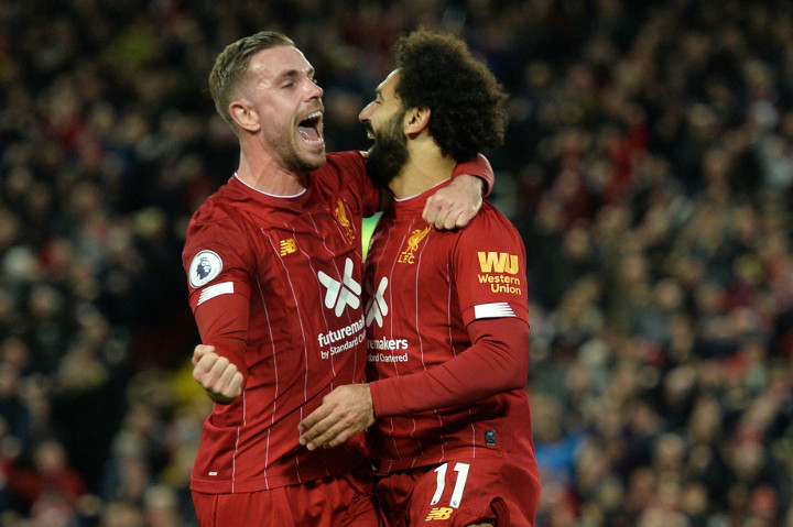 Di babak kedua, Jordan Henderson mencetak gol penyama kedudukan sebelum penalti Mohamed Salah mengukuhkan tiga poin tuan rumah. AFP Photo/Stringer