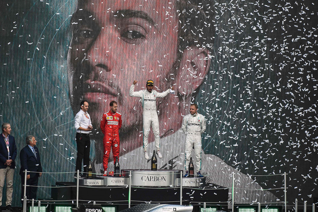Posisi kedua ditempati oleh Vettel dan Valteri Bottas yang merupakan rekan setim Hamilton finis di posisi ketiga. AFP Photo/Alfredo Estrella
