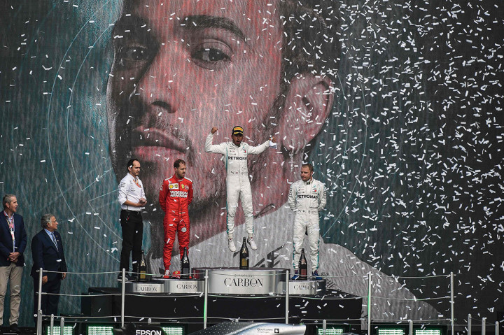 Posisi kedua ditempati oleh Vettel dan Valteri Bottas yang merupakan rekan setim Hamilton finis di posisi ketiga. AFP Photo/Alfredo Estrella