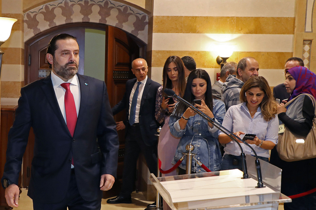 PM Hariri akhirnya mengundurkan diri dari jabatannya, menyerah pada tuntutan para demonstran. AFP Photo/Dalati and Nohra