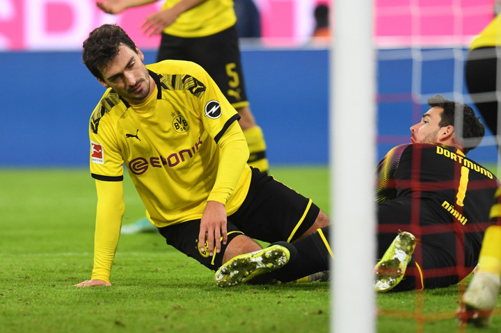 Adapun Dortmund menempati posisi kelima dengan 19 poin dari 11 laga. AFP Photo/Christof Stache