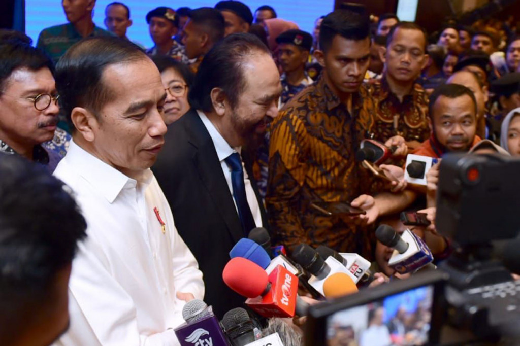 Usai acara, Presiden Jokowi dan Surya Paloh menemui para wartawan dan menggelar jumpa pers. Biro Pers Setpres/Muchlis Jr