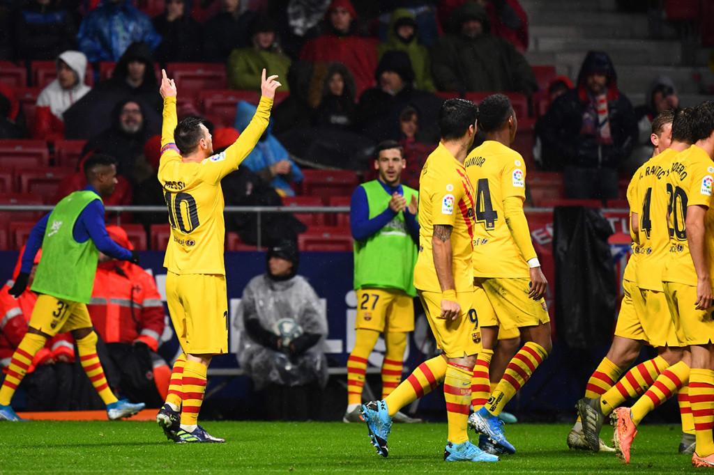 Gol tunggal Lionel Messi di menit akhir membuat El Barca menang 1-0 di Stadion Wanda Metropolitano. AFP Photo/Gabriel Bouys