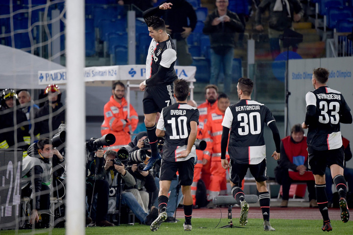 Cristiano Ronaldo melakukan selebrasi usai mencetak gol ke gawang Lazio. AFP Photo/Filippo Monteforte