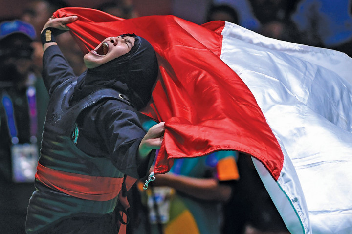 Pencak silat menambah total 10 warisan budaya tak benda yang dimiliki Indonesia, yakni, wayang, batik, pelatihan batik, angklung, Tari Saman, noken, tiga genre tradisi tari Bali, dan Kapal Pinisi. AFP Photo/Chaideer Mahyuddin