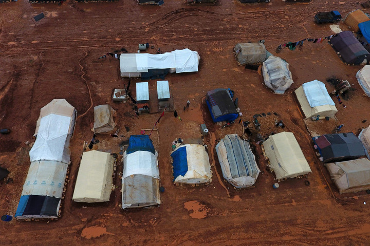 Sehingga ribuan warga Suriah ini kehilangan tempat tinggal dan sangat membutuhkan bantuan. AFP Photo/Aref Tammawi