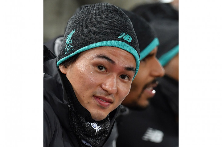 Pemain baru Liverpool asal Jepang, Takumi Minamino berada di bangku cadangan.
