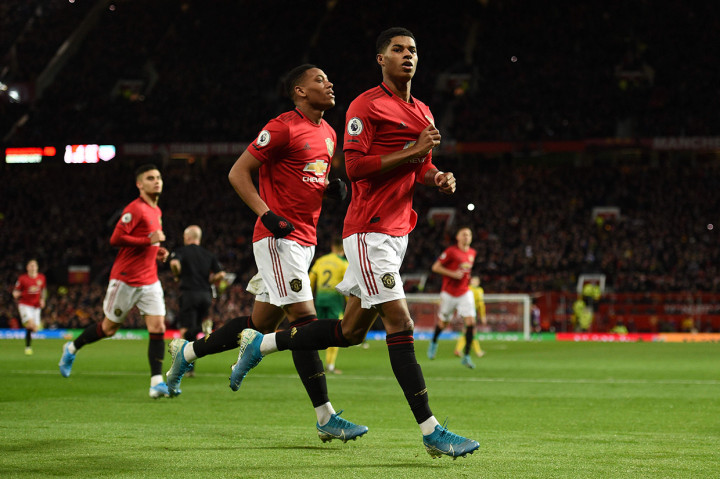 Marcus Rashford melakukan selebrasi usai mencetak gol ke gawang Norwich City.