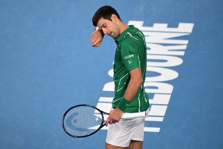 Djokovic harus berjuang selama 4 jam 3 menit untuk meraih kemenangan. AFP Photo/John Donegan