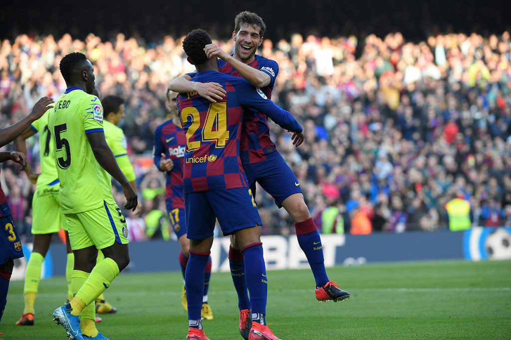 Sergi Roberto melakukan selebrasi usai mencetak gol ke gawang Getafe.