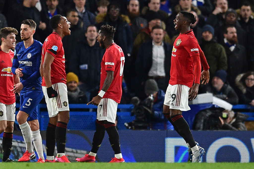 Dua gol Manchester United dicetak oleh Anthony Martial (45+2'), Harry Maguire (66'). AFP Photo/Glyn Kirk
