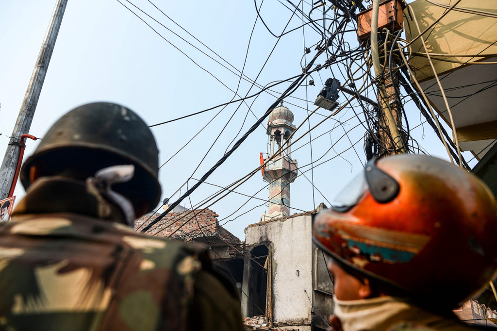 Bentrokan kini meluas menjadi perseteruan antara kelompok Hindu dan Muslim. AFP Photo/Sajjad Hussain
