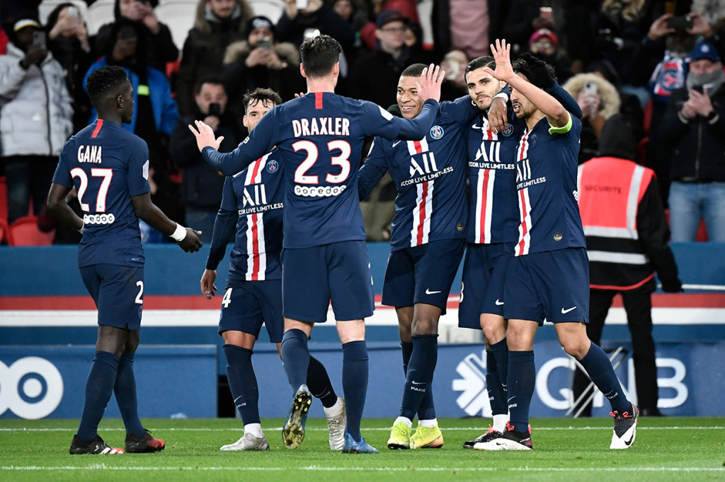 Kemenangan ini membuat PSG tetap di puncak klasemen sementara Liga Prancis dengan raihan 68 poin, unggul 13 angka dari Marseille yang menguntit di posisi kedua. AFP Photo/Stephane de Sakutin