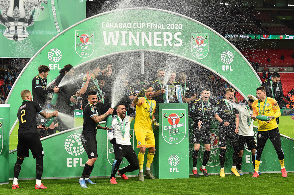 Para pemain Manchester City meluapkan kegembiraan usai memastikan diri meraih gelar juara Piala Liga Inggris untuk ketiga kalinya secara beruntun, Minggu, 1 Maret 2020 malam WIB.
