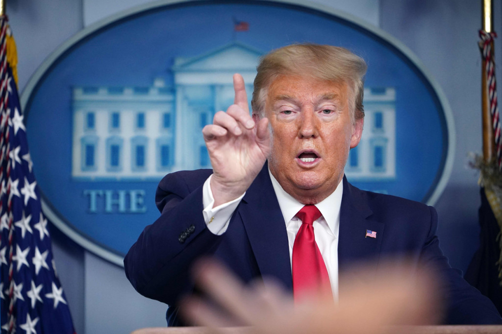 Presiden Donald Trump menuai kritikan atas respons awal yang dianggap lamban yang kini berdampak pada meluasnya pandemi virus Korona di wilayah AS. AFP Photo/Mandel Ngan