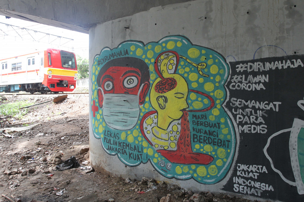 Mural tersebut bertujuan untuk menghimbau kepada masyarakat untuk menjaga jarak atau 