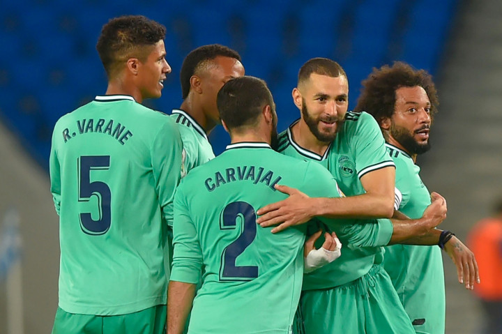 Karim Benzema menggandakan kemenangan timnya menit ke-70. 