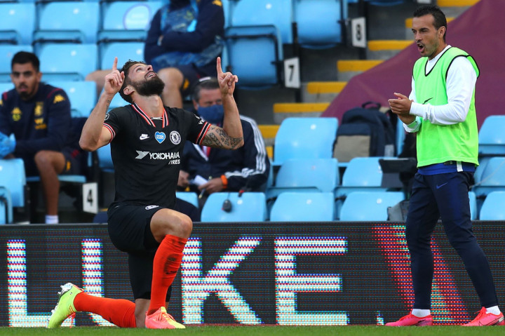 Olivier Giroud melakukan selebrasi usai mencetak gol ke gawang Aston Villa. AFP Photo/Catherine Ivill