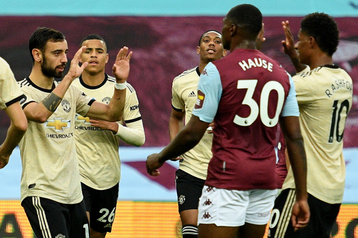 Manchester United menorehkan dua rekor dengan keberhasilan mengalahkan Aston Villa 3-0 dalam lanjutan Liga Inggris di Villa Park. AFP Photo/Oli Scarff