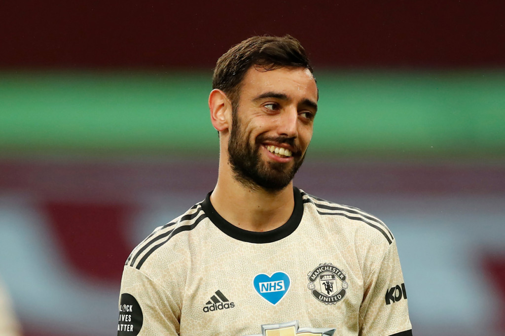 Selain rekor itu, dua pemain MU juga menorehkan catatan apik lain. Bruno Fernandes sudah memberi 6 assist dalam 10 laga terakhir Liga Inggris. Ia menyamai rekor Arjen Robben, Ángel Di María, Mesut Ozil, Lee Sharpe, David Ginola, dan Dusan Tadic. AFP Photo/Andrew Boyers