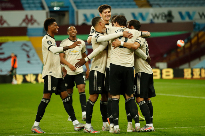 Berkat kemenangan atas Aston Villa, Manchester United kini kian dekat ke posisi empat besar. Mereka ada di urutan kelima dan hanya terpaut satu poin dari Leicester City yang ada di atasnya. AFP Photo/Andrew Boyers