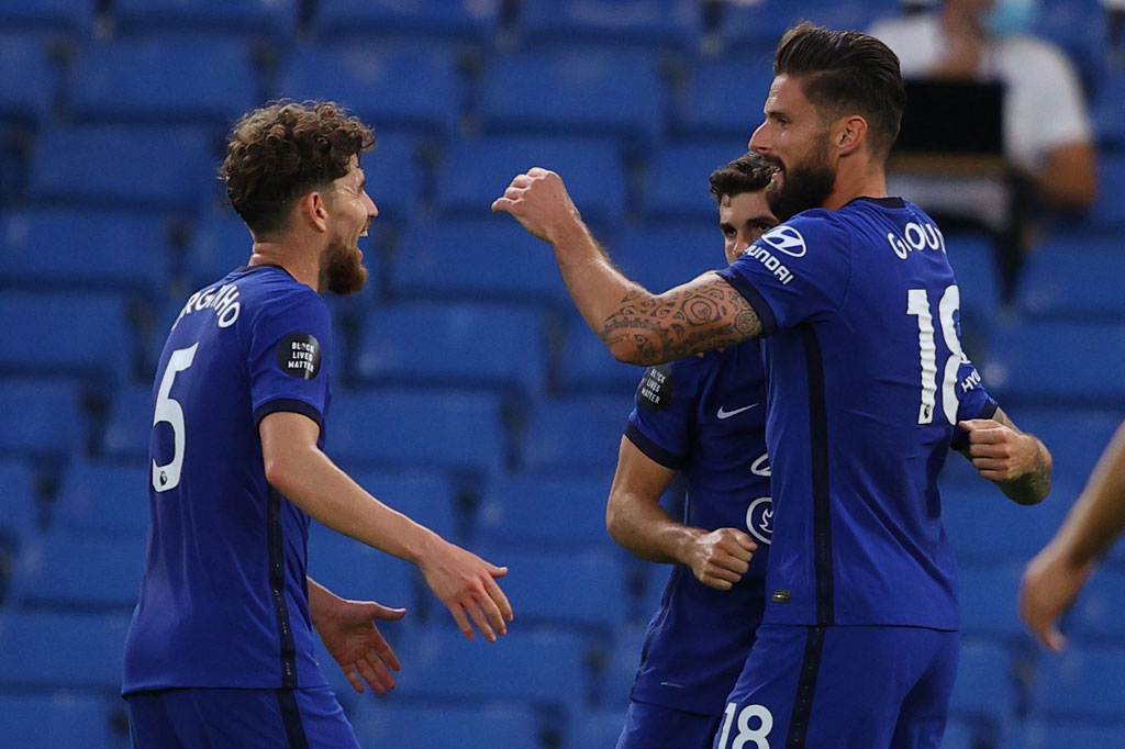 Giroud melakukan selebrasi usai menjebol gawang Norwich City yang dikawal Tim Krul.