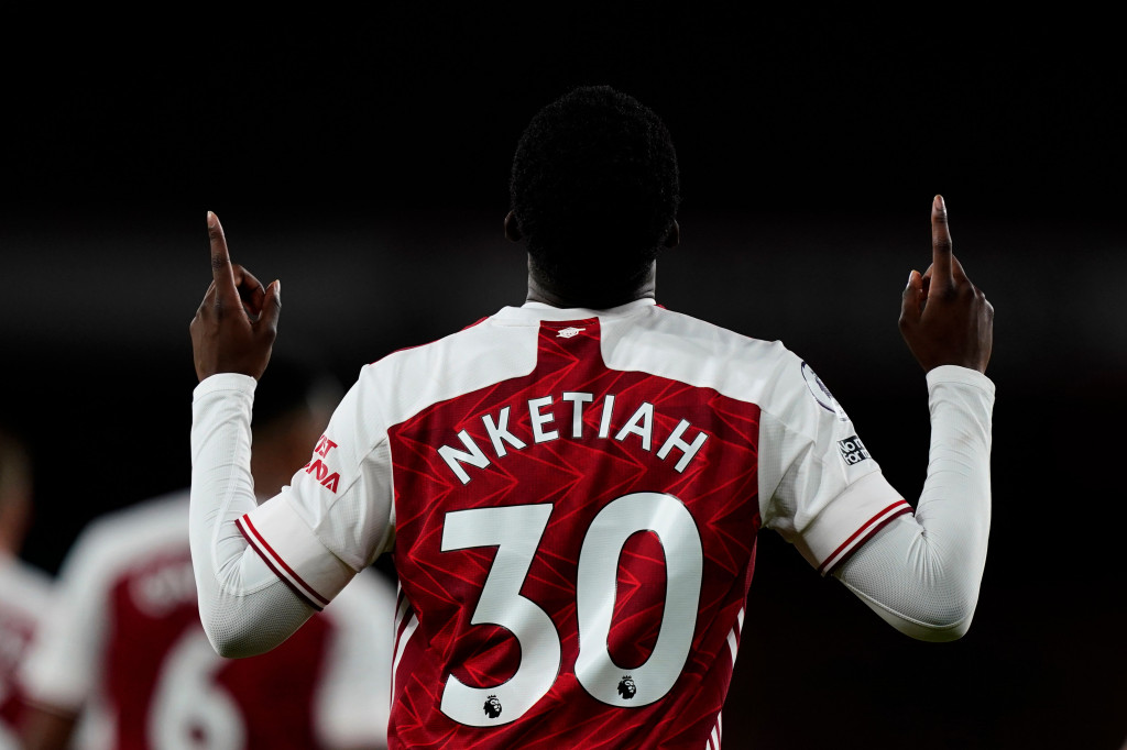 Eddie Nketiah tampil menjadi penyelamat bagi Arsenal setelah mencetak gol lima menit jelang laga berakhir. AFP Photo/Will Oliver