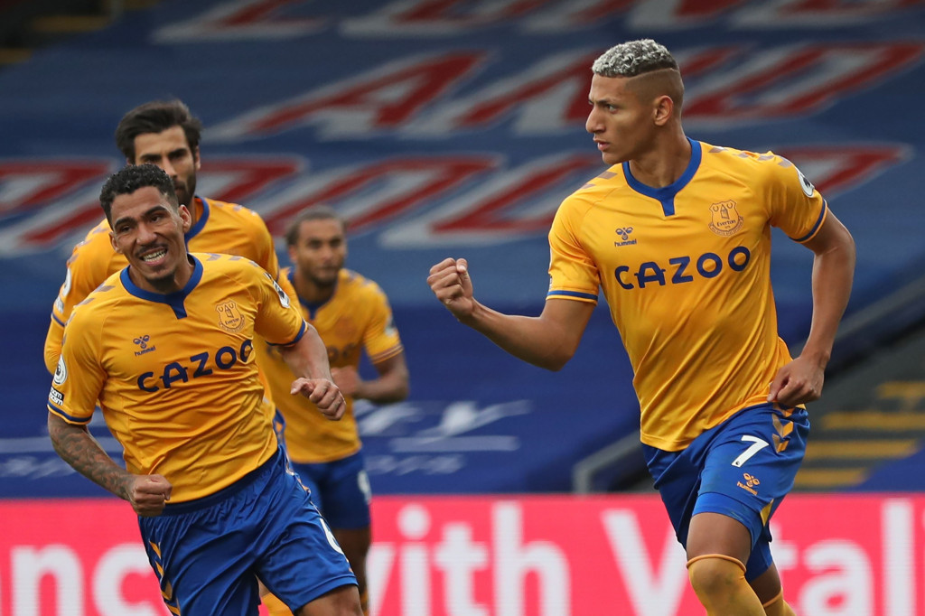 Richarlison melakukan selebrasi usai mencetak gol ke gawang Crystal Palace. AFP Photo/Bradley Collyer