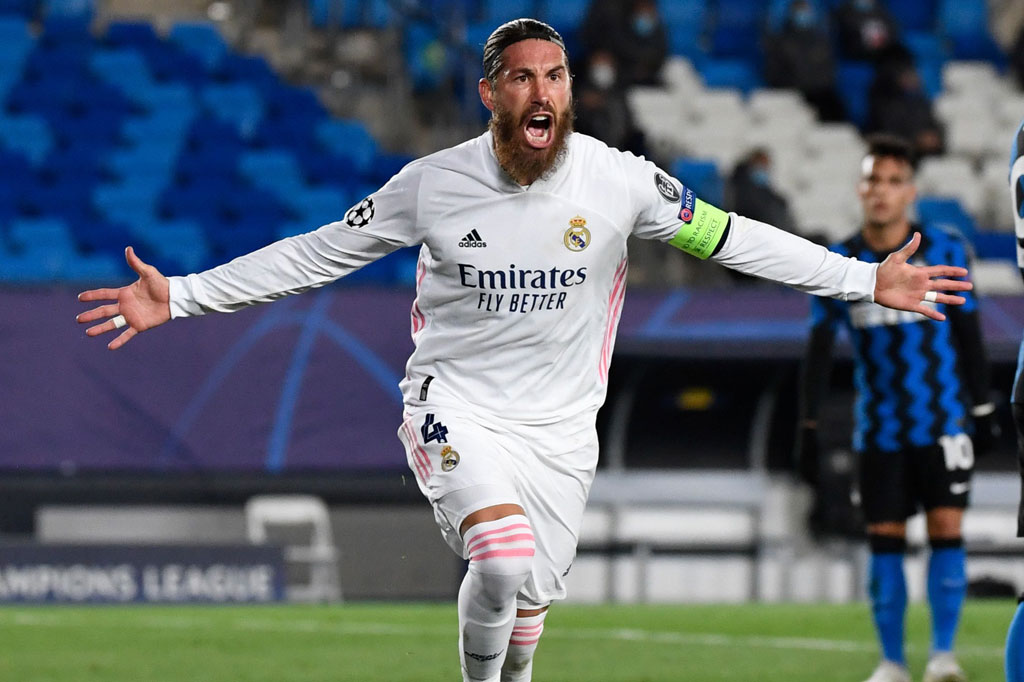 Sergio Ramos melakukan selebrasi usai menjebol gawang Inter Milan. Itu merupakan gol ke-100 Ramos untuk Los Blancos.