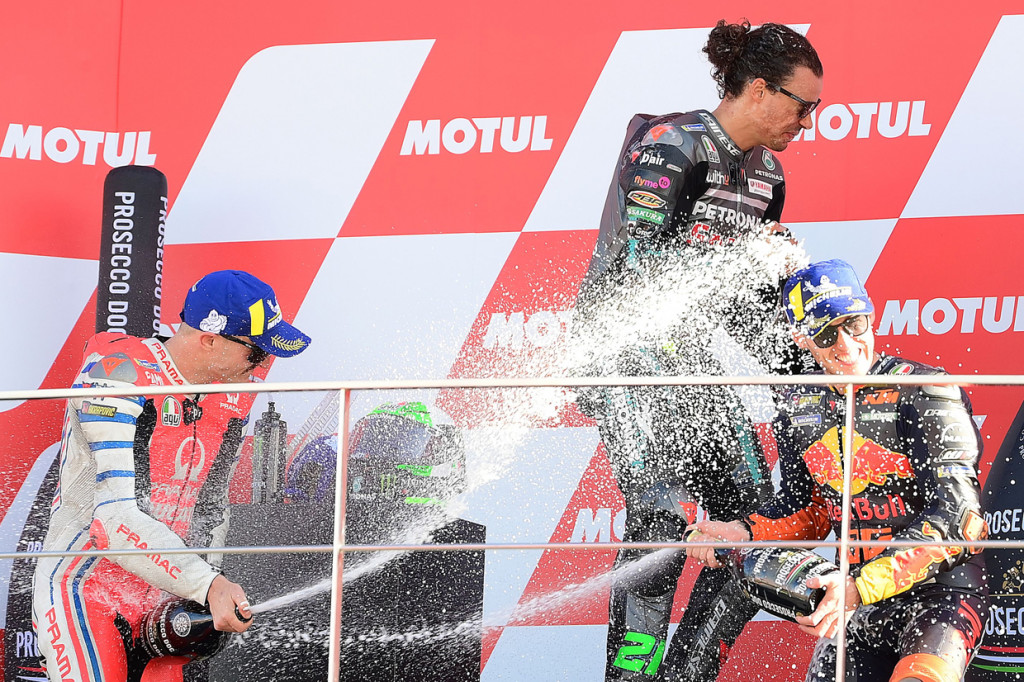 Morbidelli sukses naik podium juara MotoGP Valencia ditemani oleh Jack Miller (Paramac Ducati) dan Pol Espargaro (KTM Red Bull).