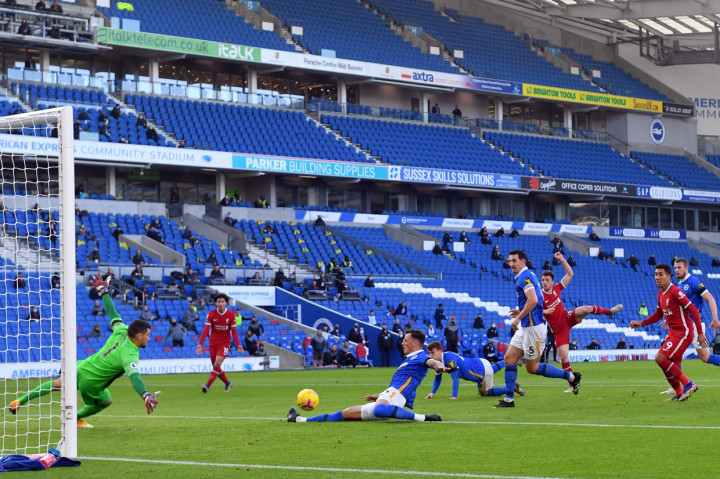 Kedua tim bermain imbang tanpa gol di sepanjang babak pertama, kemudian the Reds membuka skor melalui Diogo Jota. AFP Photo/Mike Hewitt