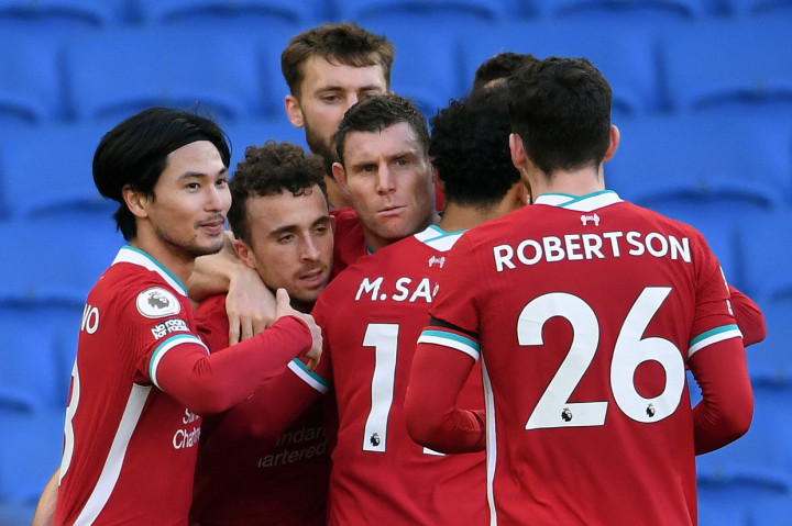Dengan satu tambahan angka yang diperoleh Liverpool naik ke posisi teratas klasemen usai mengoleksi 21 poin hasil 10 pertandingan. AFP Photo/Mike Hewitt