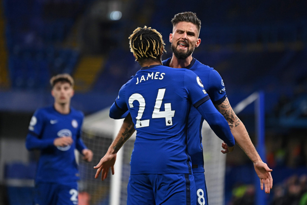 Olivier Giroud kemudian membalas untuk memaksa paruh pertama berakhir 1-1. AFP Photo/Daniel Leal-Olivas