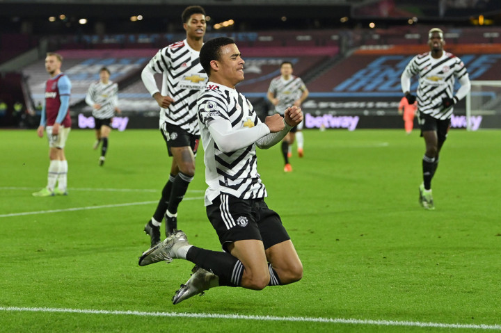 MU untuk pertama kalinya unggul di laga ini pada menit ke-68. Mason Greenwood melepaskan tendangan keras dari dalam kotak penalti untuk menggetarkan gawang West Ham dan mengubah skor jadi 2-1. AFP Photo/Justin Setterfield