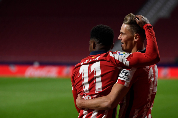 Mereka unggul berkat gol Thomas Lemar dan Marcos Llorente.