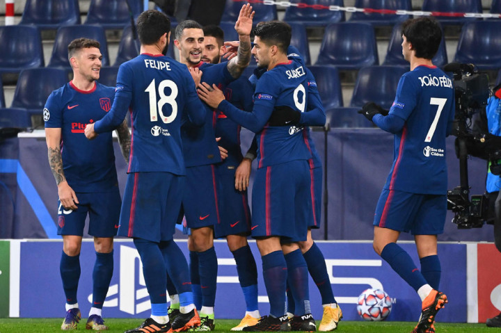 Mario Hermoso melakukan selebrasi usai membuka keunggulan untuk Atletico Madrid.