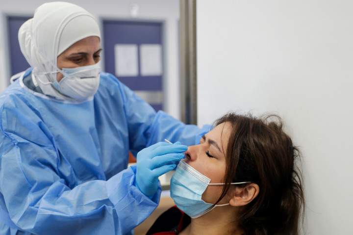 Selain Inggris, Lebanon juga mengumumkan kebijakan lockdown penuh selama tiga minggu, termasuk jam malam, untuk mencegah peningkatan kasus Covid-19 di negara tersebut. AFP Photo/Joseph Eid