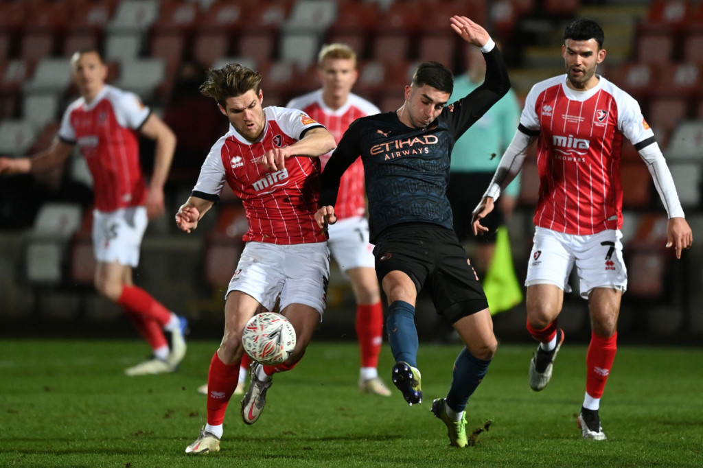 City dibuat frustrasi setelah banyak peluang diredam oleh kegigihan Cheltenham menggalang pertahanan sepanjang babak pertama.