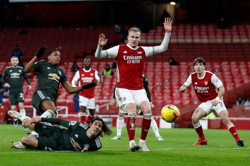 Arsenal memang kalah penguasaan bola, 46 persen berbanding 57 persen. AFP Photo/Alastair Grant

