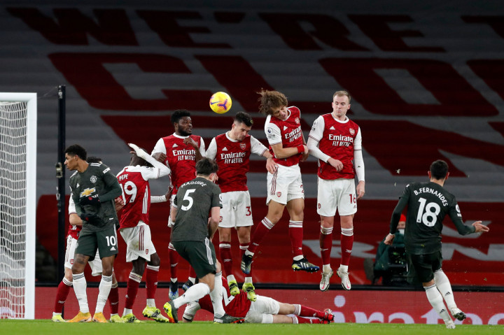 Sementara itu, Manchester United tetap berada di peringkat kedua dengan 41 poin dari 21 laga, terpaut tiga poin dari tetangga mereka, Manchester City, yang berada di puncak. AFP Photo/Alastair Grant