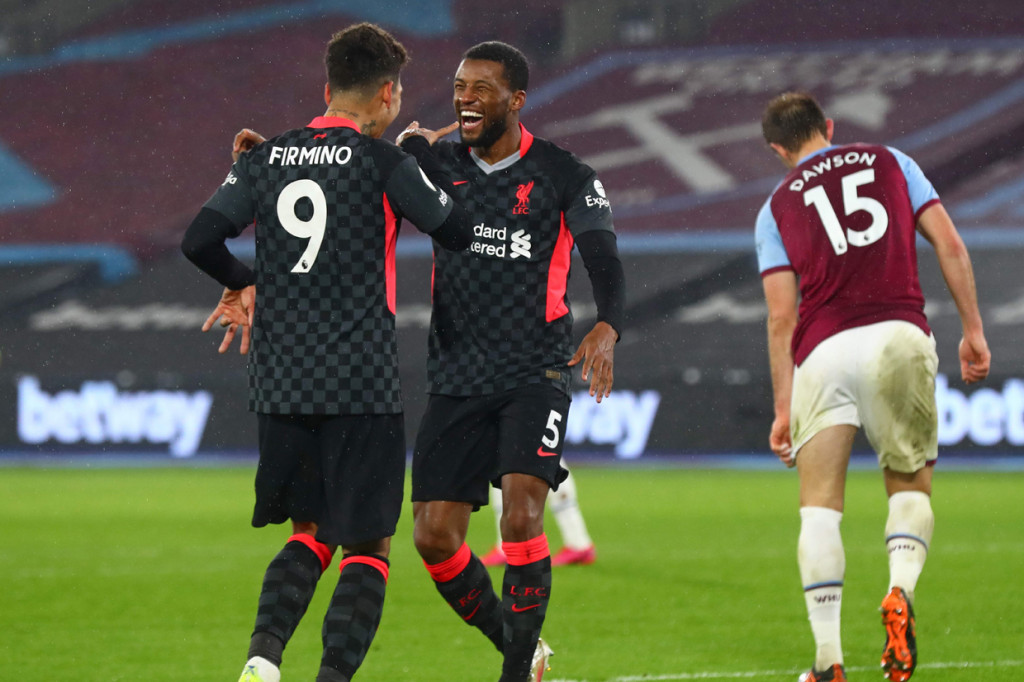 Keunggulan skuad asuhan pelatih Juergen Klopp bertambah enam menit sebelum laga usai melalui aksi gelandang Georginio Wijnaldum. AFP Photo/Clive Rose