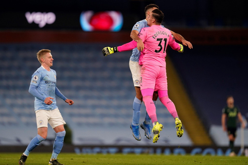 Manchester City memetik kemenangan penuh kala menjamu Tottenham Hotspur di Etihad Stadium. Dua gol Ilkay Gundogan membawa Citizens menang 3-0. AFP Photo/Tim Keeton
