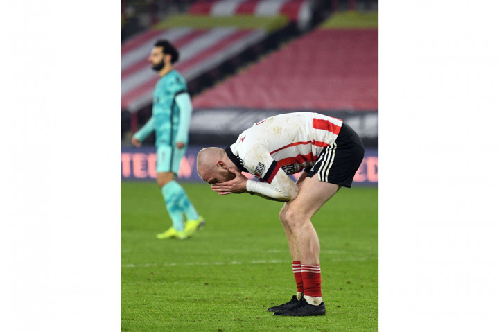 Sheffield nyaris menyamakan skor pada menit ke-57. Namun, bola hasil sundulan McBurnie yang memanfaatkan umpan silang George Baldock hanya meluncur tipis di samping gawang Liverpool.